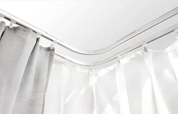 Karnisz na wykusz: typy, montaż i jak dopasować do wystroju wnętrza?